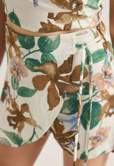 SKORT FLORAL ΜΕ ΔΕΣΙΜΟ ΣΤΟ ΠΛΑΪ-ΠΡΑΣΙΝΟ