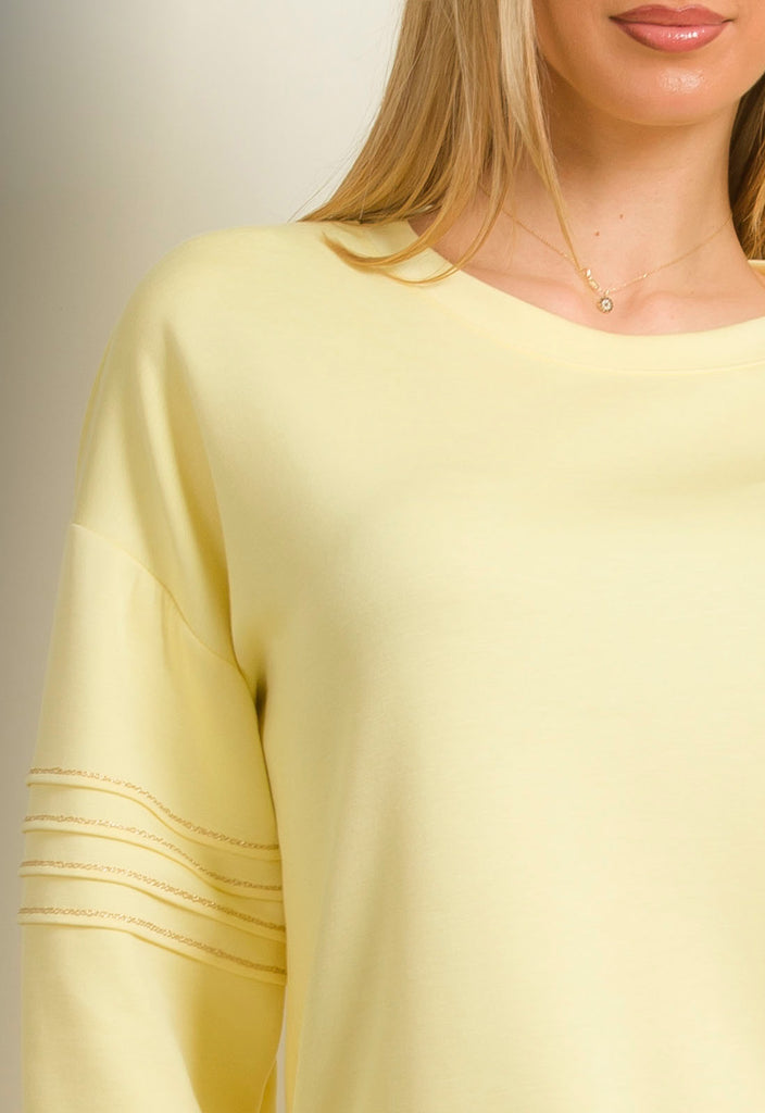 ΜΠΛΟΥΖΑ ΤΥΠΟΥ ΦΟΥΤΕΡ ΜΕ ΣΧΕΔΙΟ ΣΤΟ ΜΑΝΙΚΙ-ΚΙΤΡΙΝΗ