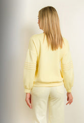 ΜΠΛΟΥΖΑ ΤΥΠΟΥ ΦΟΥΤΕΡ ΜΕ ΣΧΕΔΙΟ ΣΤΟ ΜΑΝΙΚΙ-ΚΙΤΡΙΝΗ